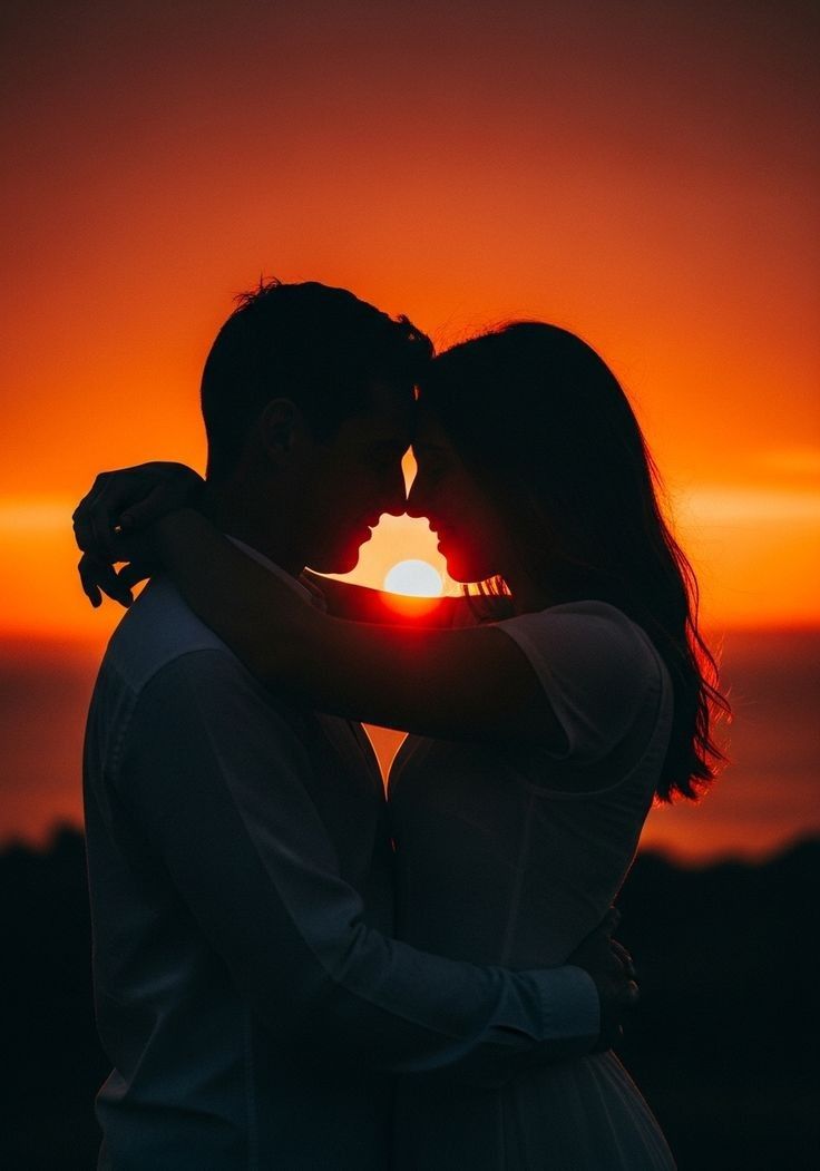 Couple embracing at sunset