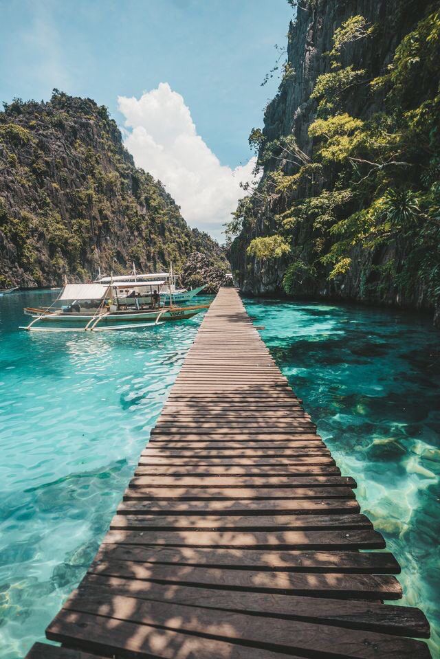 Woman relaxing on a dock in Coron